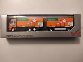 Volvo FH GL Wechselkoffer-HZ "DEKRA Akademie" von Herpa 1/87