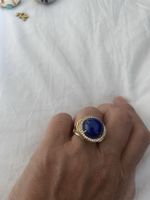 Ring mit blauem Stein und Zirkonia goldfarben Zustand neu