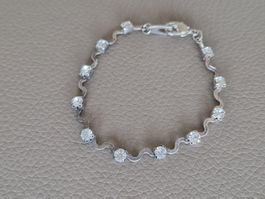 Armband silbrig mit Zirkonia und wellenförmig