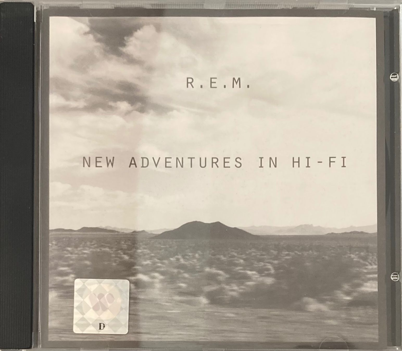 CDs: R.E.M. - NEW ADVENTURES IN HI FI – D'occasion à Poliez-Pittet par Newtown-Records