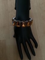 Vtge. Armband mit bernsteinfarbigen Steinen gebraucht