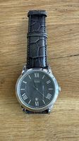 Montre Hugo Boss presque neuve