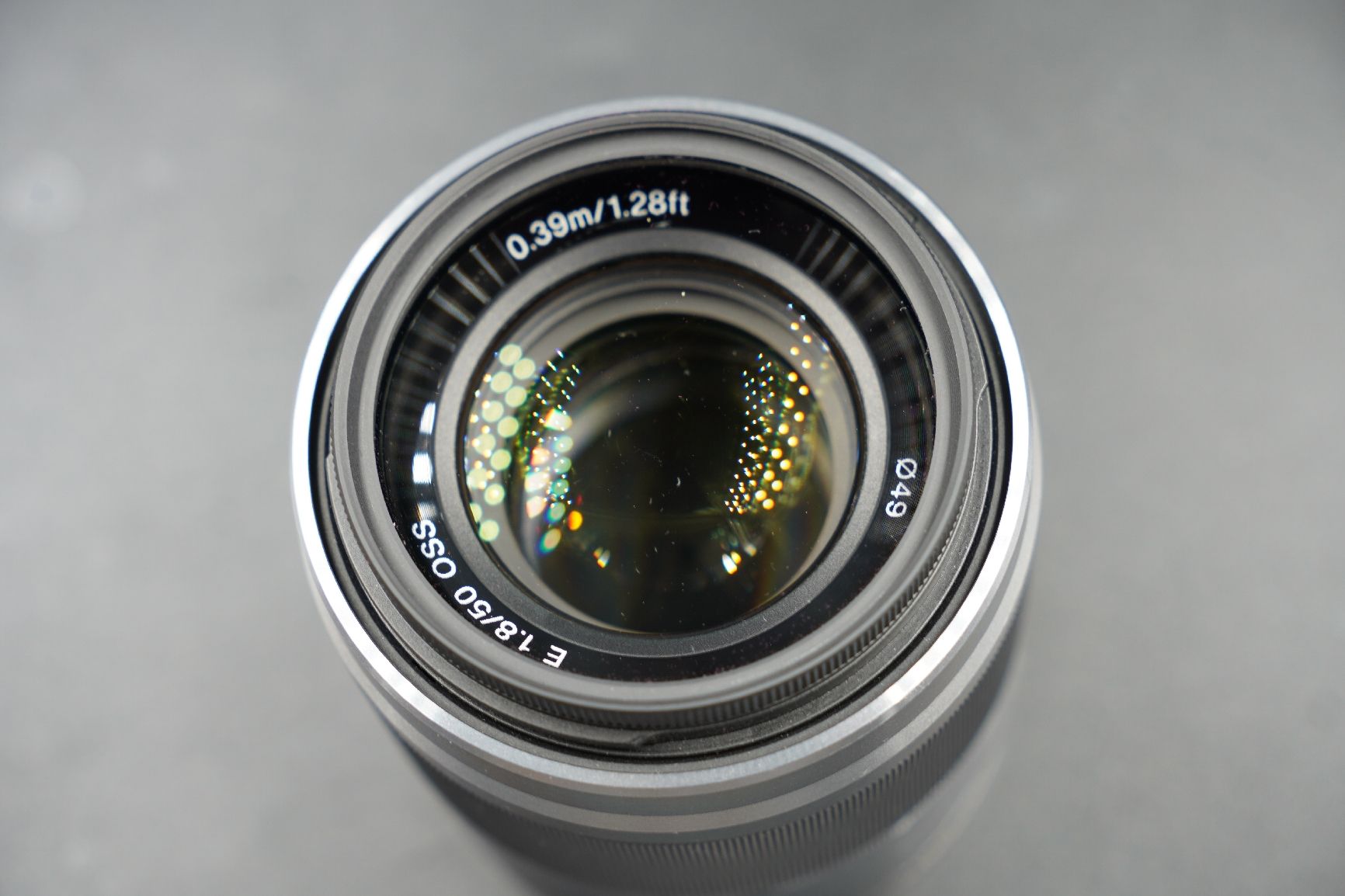 Sony Objektive: Objektiv Sony E 1.8/50 OSS SEL50F18 silber gebraucht APSC – Gebraucht aus Niederhasli von Adrianson 5