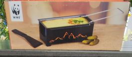 Raclette mit Teelichtkerzen