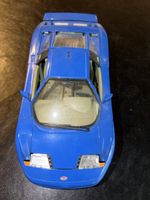 Spielzeugauto Bugatti EB110 blau guter Zustand