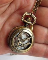 NEUE Umhängeuhr mit Kette  Spottölpel zu Tribute von Panem
