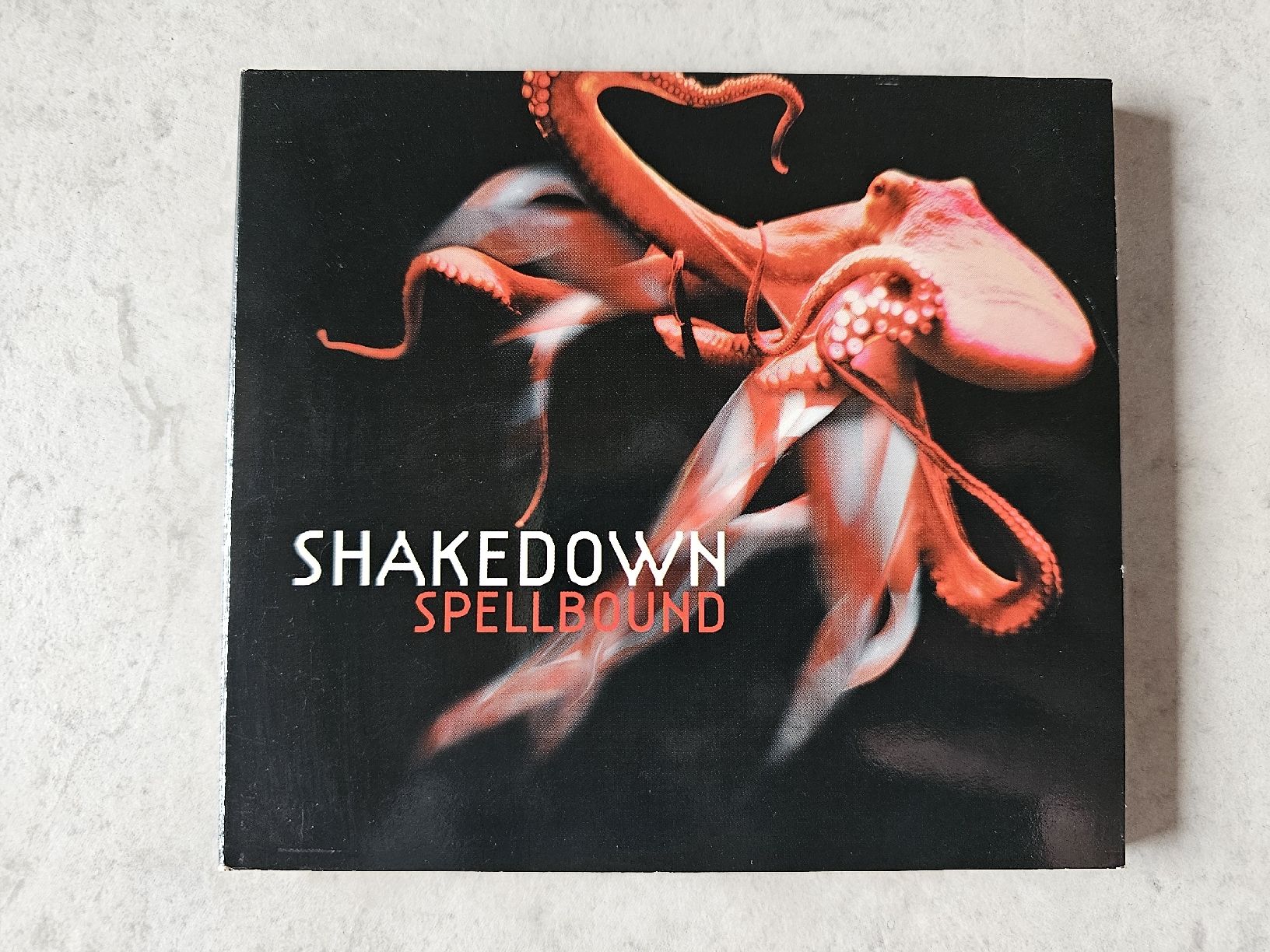 CD: Shakedwon  -  Spellbound – Usato da Schneisingen venduto da backstore24