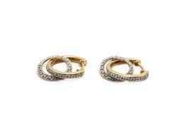 Creolen in 14K Gold mit Diamanten und feinen Details