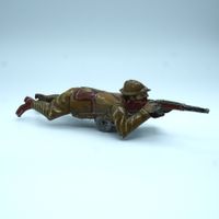 Blechsoldat mit Gewehr und Uhrwerk