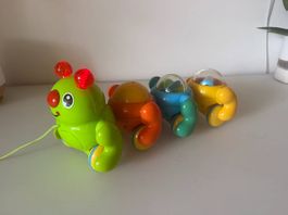 Train musical Brio  Chenille avec 4 wagons-capsules