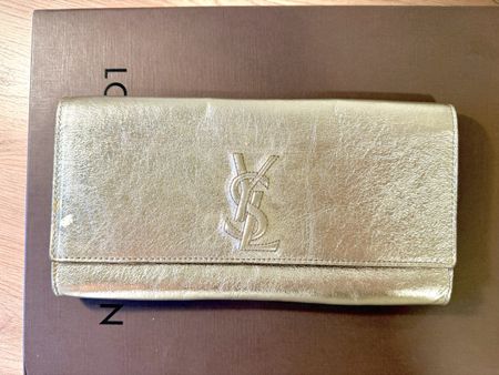 Yves Saint Laurent Lederclutch goldig