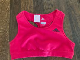 Adidas Sporttop Fuchsia Gr. L (164).           Alter: 13-14y