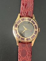 Goldwyn Armbanduhr Handaufzug rot goldfarben Vintage
