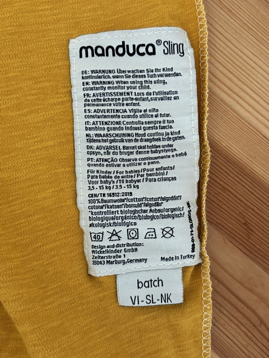 Manduca Marsupi portabebè: Manduca Sling, Tragetuch, Gelb/Gold – Usato da Prêles venduto da 21rena 4