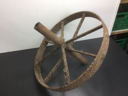 Altes rostiges Eisen Speichenrad für Garette
