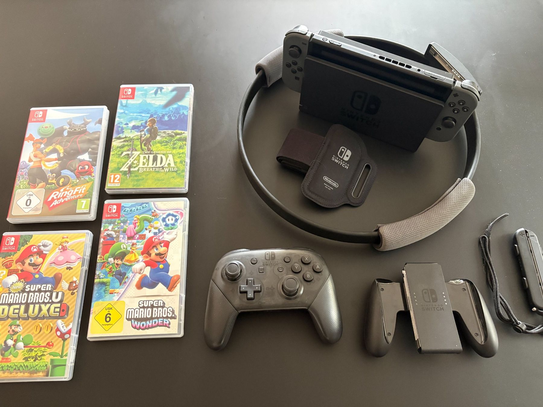 Nintendo Konsolen: Nintendo Switch Set + 4 Spiele + Pro Controller + Ring Fit – Gebraucht aus Steffisburg von Octabrain