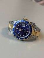 Rolex Submariner Date Edelstahl/Gelbgold Blau