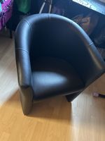 Fauteuil en cuir noir