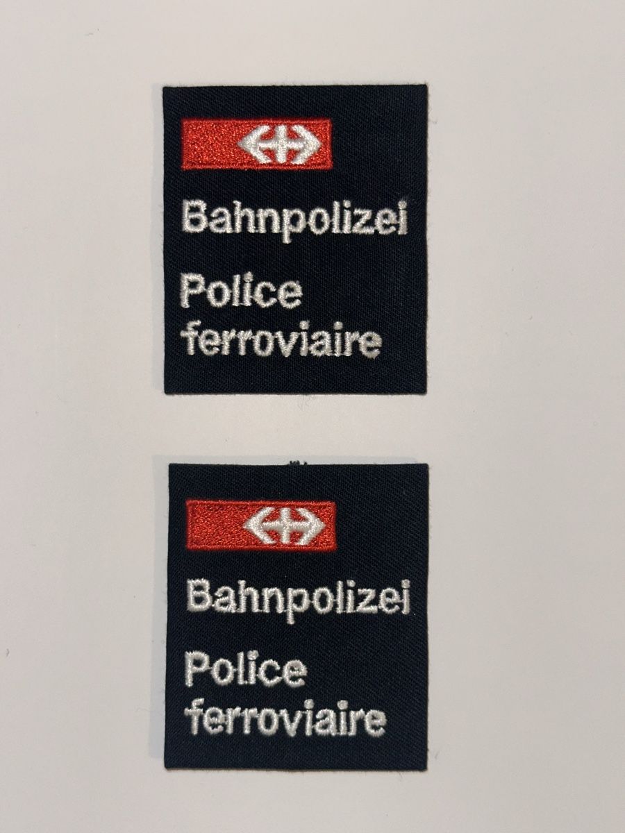 SBB/CFF/FFS Placchette & Badge: Polizei SBB Schweiz patten – Nuovo e nell'imballaggio originale da Castione venduto da DWNL