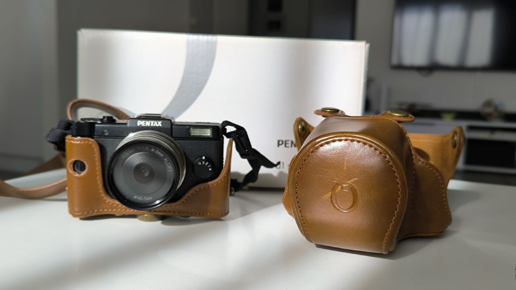 Pentax Fotocamera: Pentax Q pack complet + accesoires – Usato da Riaz venduto da vanucaptures