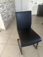 Stuhl Lederlook Schwarz Gestell Metall guter Zustand