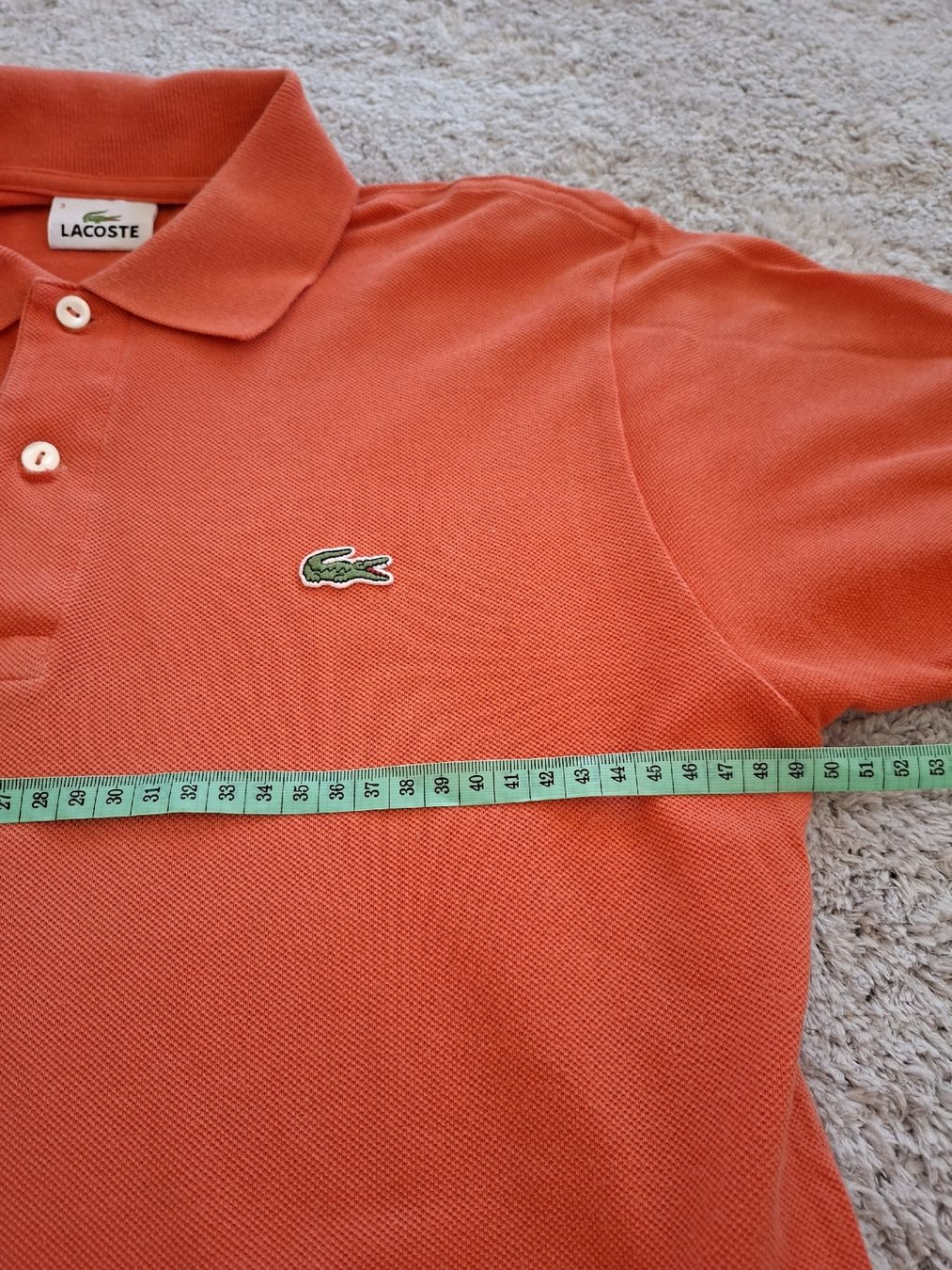 Lacoste Polo-Shirts: Polo Lacoste orange taille 3 occasion  – Gebraucht aus Renens VD von ser_j2fn 1