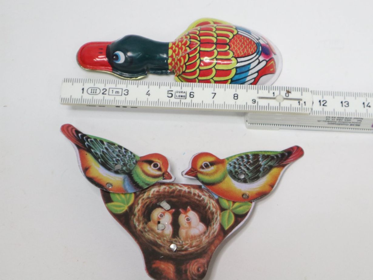 Giocattoli: 2x Blech Knackfrosch Ente + Vogel Nest – Nuovo (secondo la descrizione) da Eschenbach SG venduto da Astalavista 1
