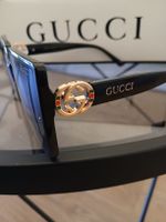 Lunettes de soleil Gucci noires, parfaites pour l'été!