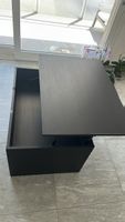 Schwarzer IKEA-Couchtisch mit Hubfunktion