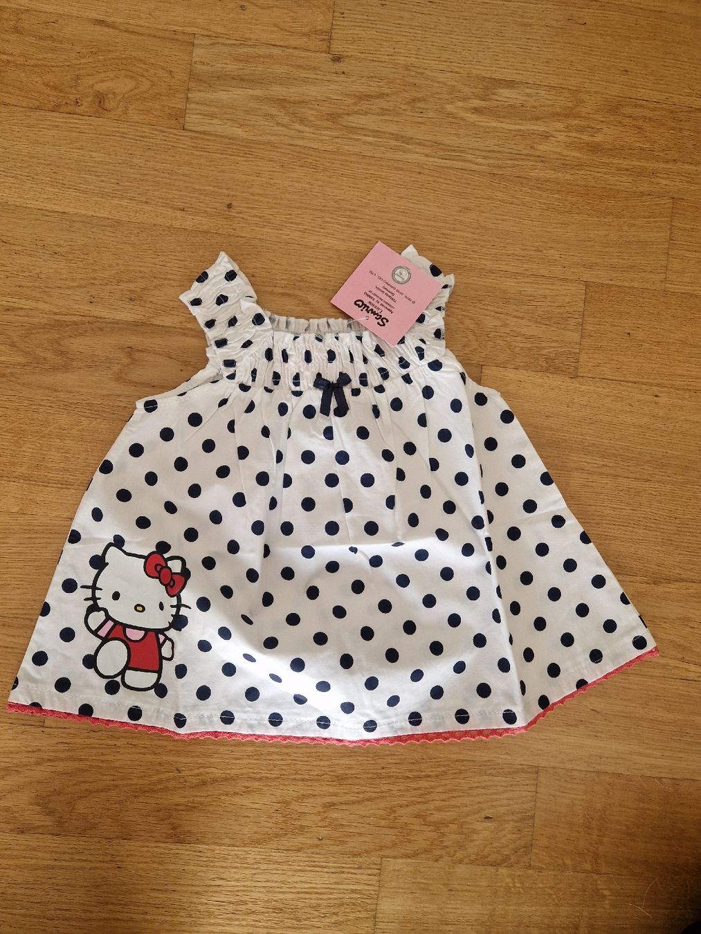 Vestiti & Gonne: Robe Hello Kitty à pois, neuve avec étiquette, taille 68 – Nuovo e nell'imballaggio originale da Penthaz venduto da Sosotroc