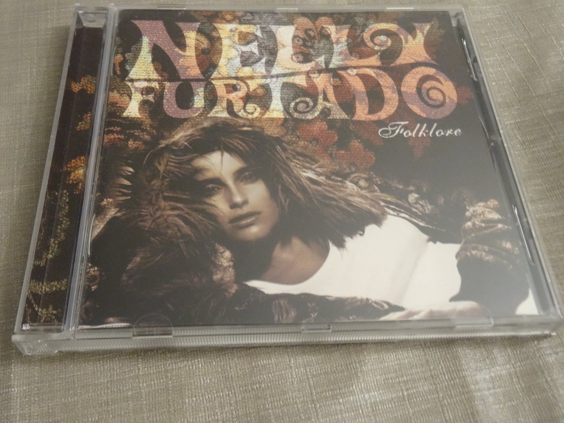 CDs: Nelly Furtado - Folklore CD – Gebraucht aus Olten von Disc-Ausverkauf