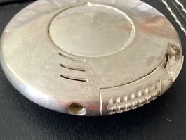 Briquet vintage métal argenté rond mécanique usagé