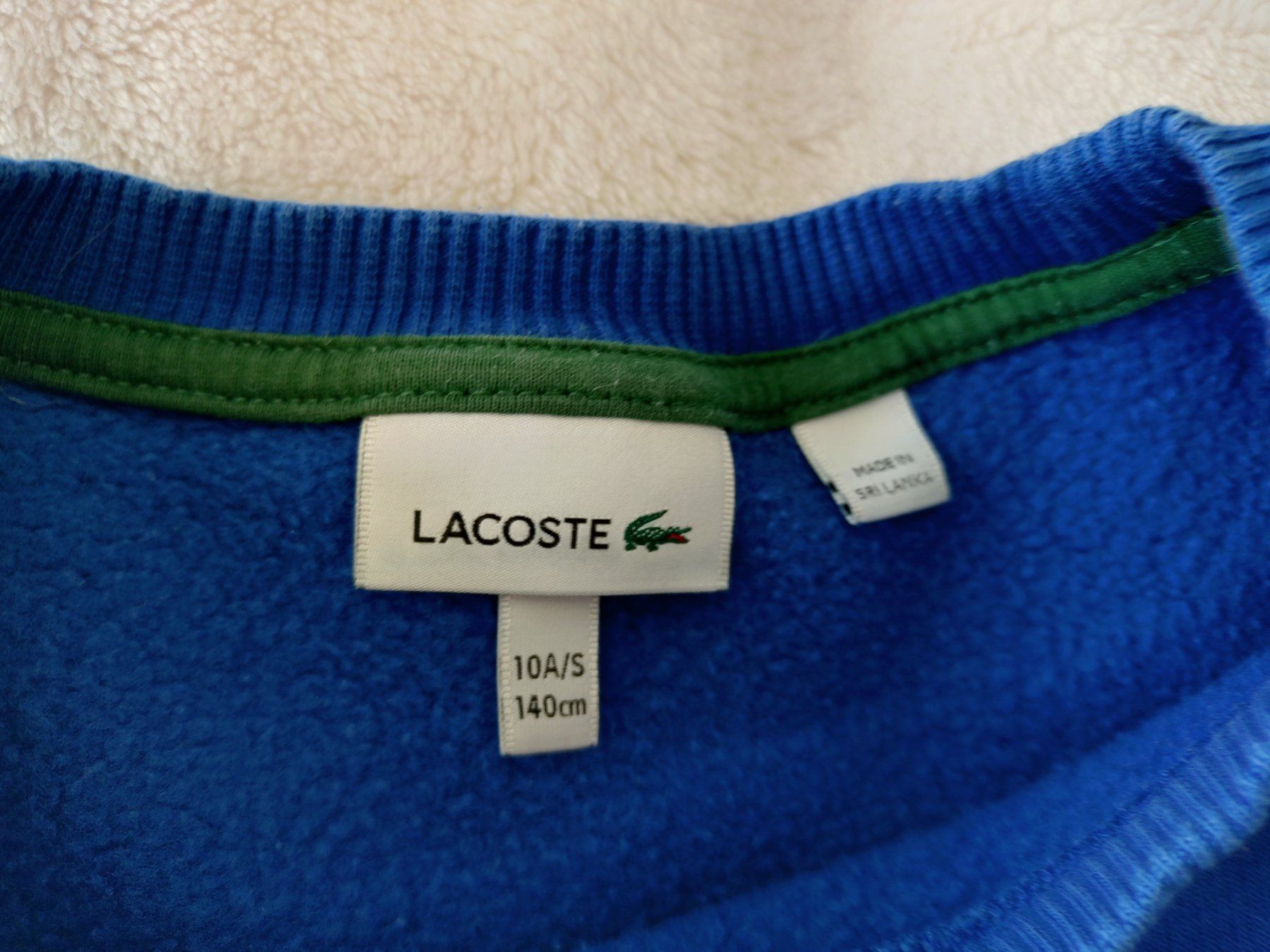 Lacoste Pulls et sweat-shirts: Lacoste Pullover blau Grösse 140 cm gebraucht – D'occasion à Bottmingen par Pidi0 1