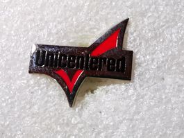 Ansteckpin 62: Unicentered