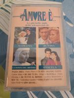 Amore È... (Cass, Comp, Dol) NEU!!