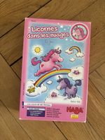 Jeux licorne dans les nuages 