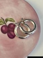 Créoles dorées en acier inoxydable avec zircons blancs