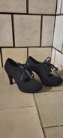 schwarze Pumps