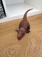 Dinosaurier Figur Carnotaurus braun guter Zustand