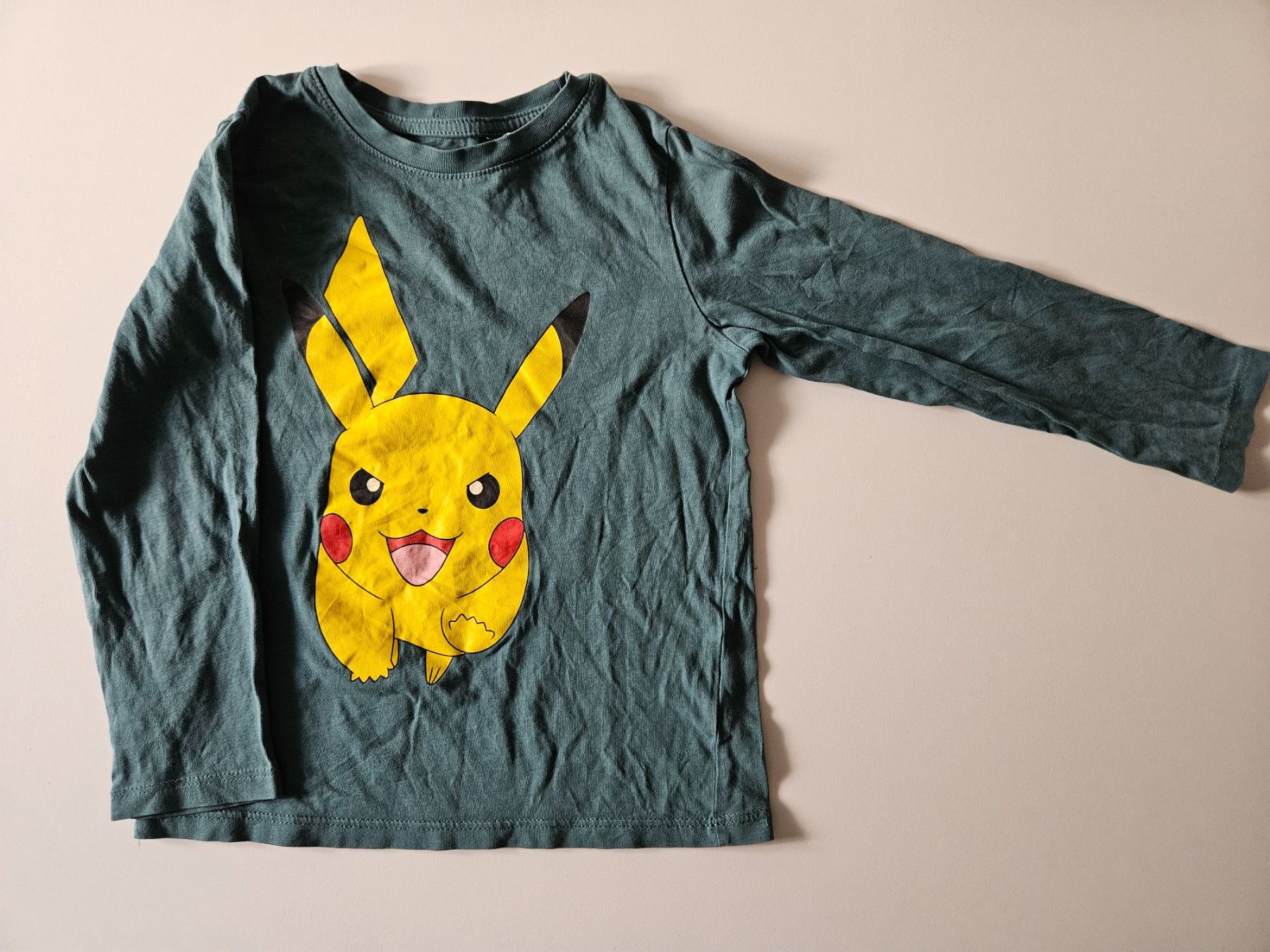 H&M Maglioni & Felpe: H&M Pikachu Pulli / Langarmshirt, Gr. 110/116 – Usato da Bern venduto da Oloui
