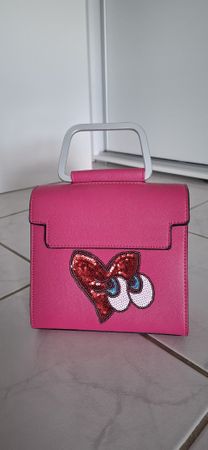 Handtasche pink mit Herz-Applikation