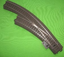 C-Gleis Bogenweiche LINKS Märklin 24671   NEU   Jg1999