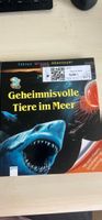 Geheimnisvolle Tiere im Meer mit vielen Klappen