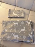 Kuschelige Winterdecke mit Reh-Motiv für gemütliche Abende