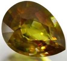 0.57 CT. BEST OLIVE GREEN SPHENE / Wert: CHF 50.00