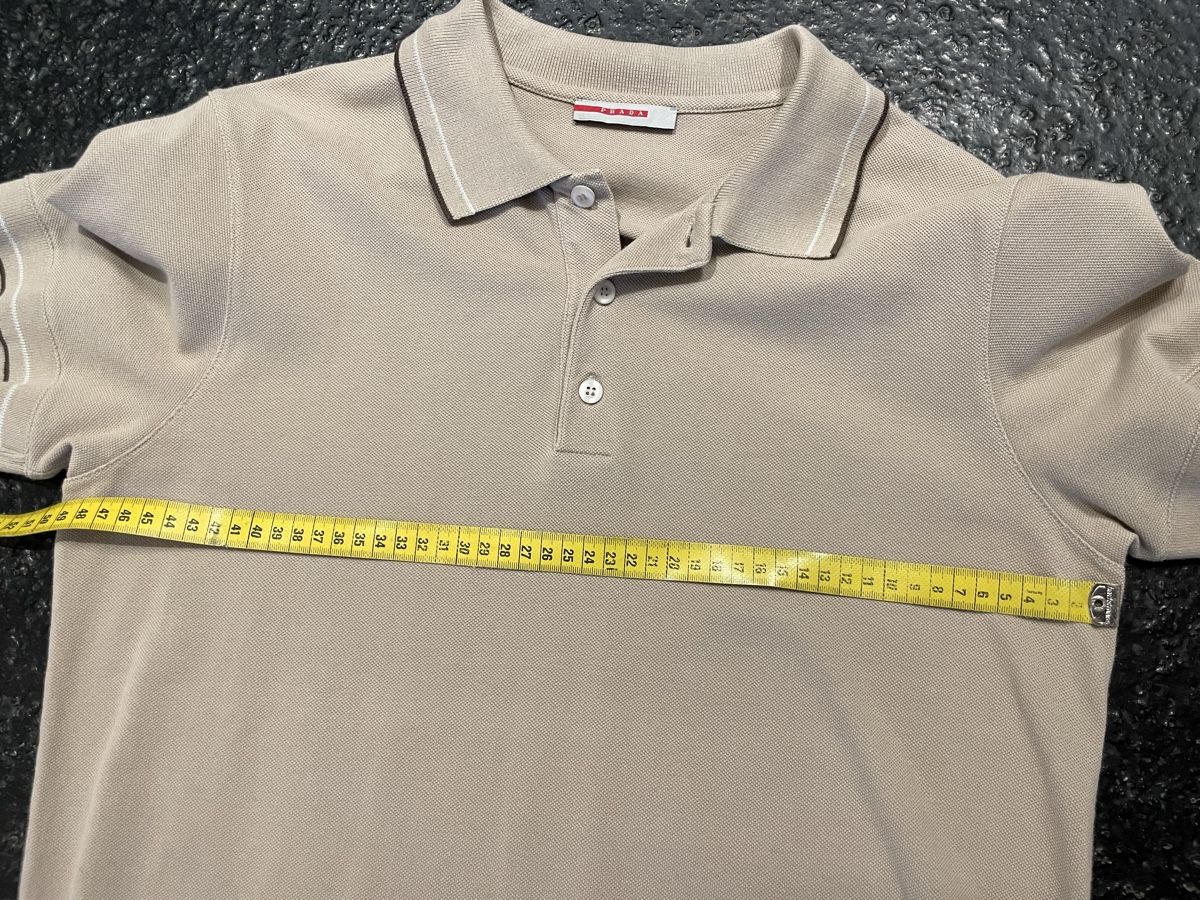 Prada Magliette Polo: Prada Polo-Shirt Beige – Usato da Windisch venduto da rascale 5