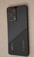 Smartphone Xiaomi Redmi Note 12 Pro 5G noir avec  coques.