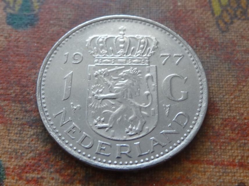 Tutti le monete: PAYS-BAS  Nederland  1  Gulden  1977 – Usato da Romanel-sur-Lausanne venduto da Swift13