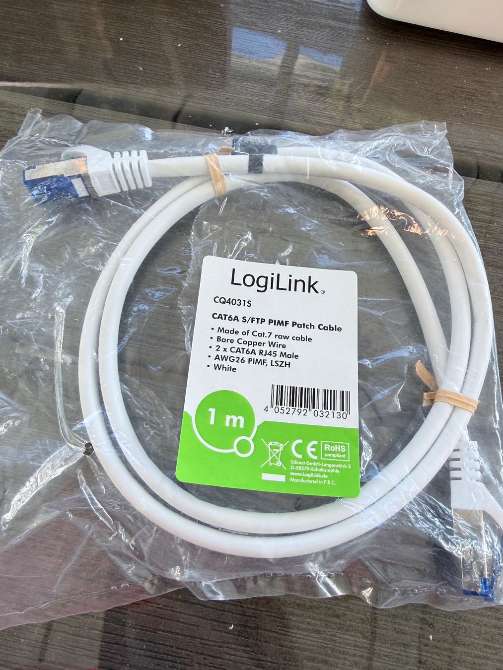 Cavi: LogiLink Netzwerkkabel S/FTP, Cat6a, 1m weiss – Usato da Winterthur venduto da Puma2662