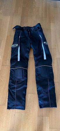 Pantalon de protection pour deux roues